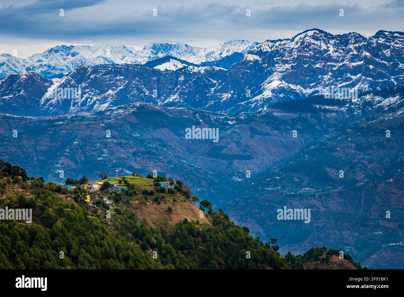 Snow patterns on farming fields in the Himalayan mountains on Trek to Dalhousie, Himachal Pradesh. Colourful, vibrant Landscape. Stock Photo