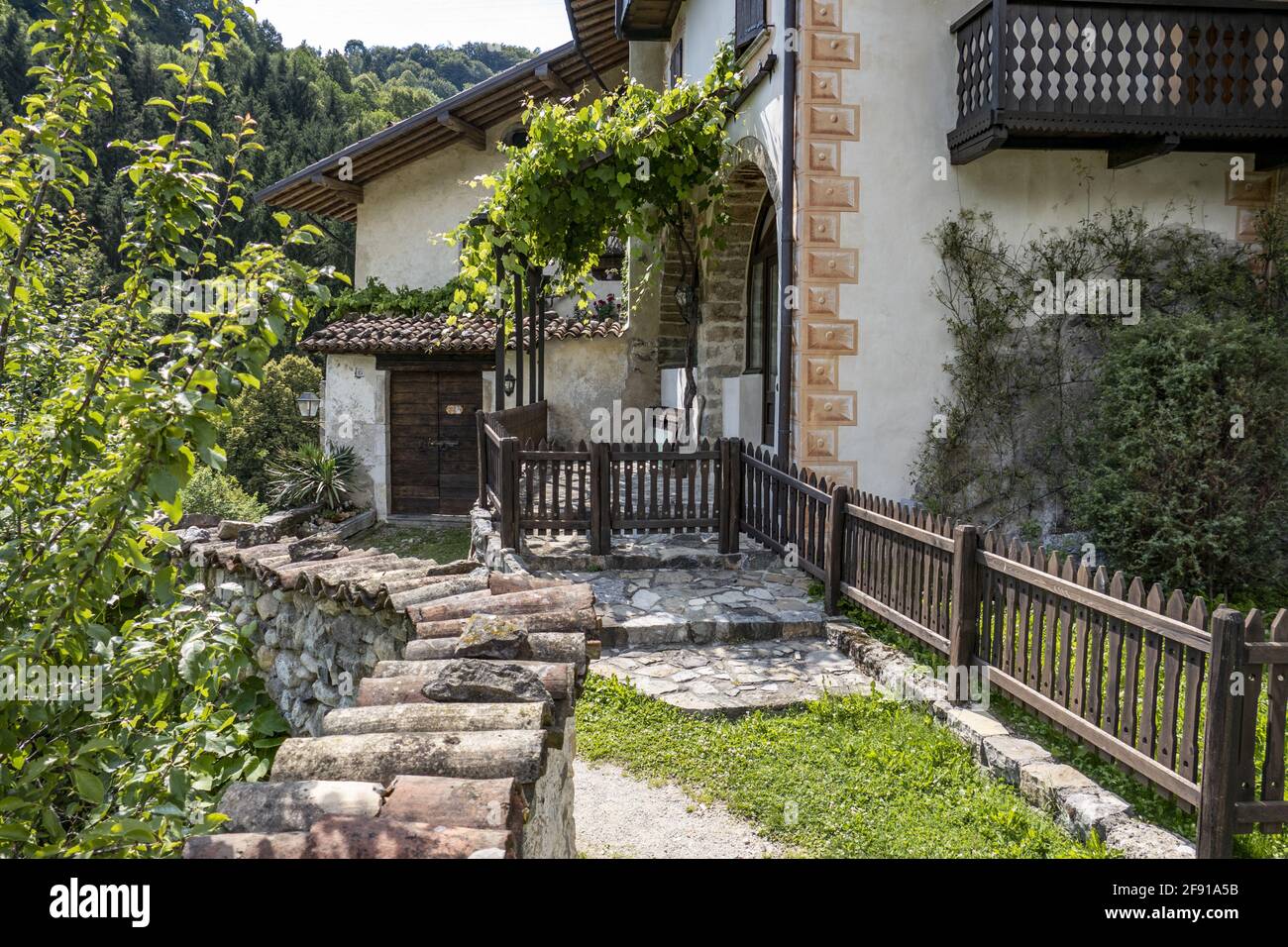 Wooden path on the backyard of an old house in Cornello dei Tasso, ancient medieval village Stock Photo