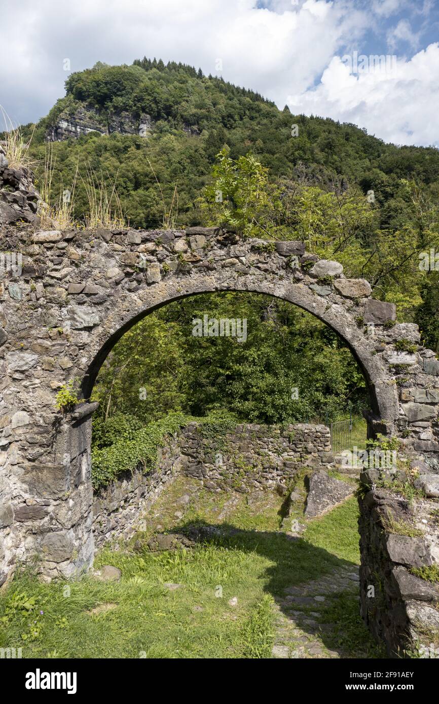 Closeup of a stone arch in an ancient medieval village of Cornello dei Tasso in Lombardy, Italy Stock Photo