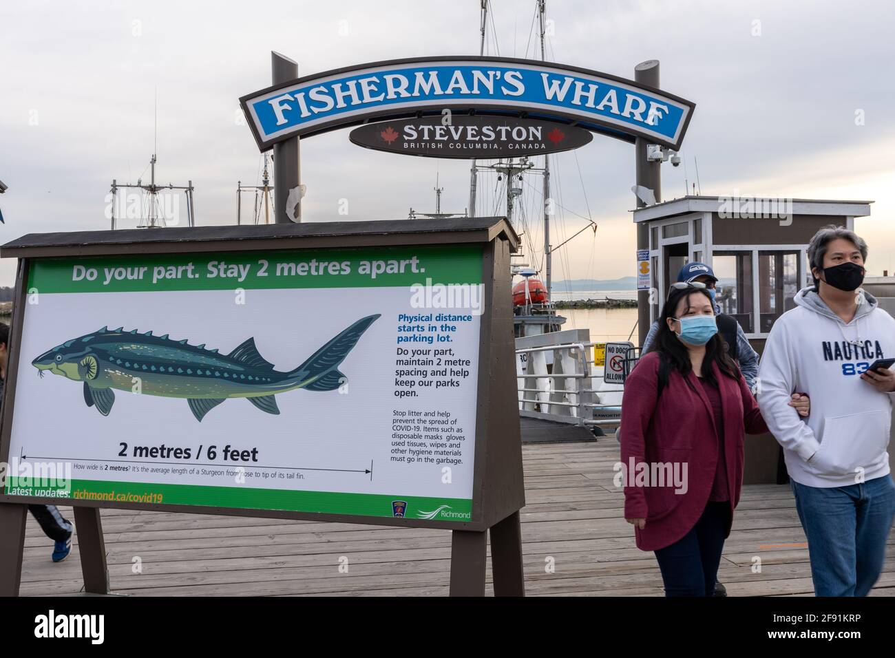 Steveston Harbour Fisherman's Wharf. People wearing face mask during covid-19 pandemic period. Richmond, BC, Canada. Stock Photo