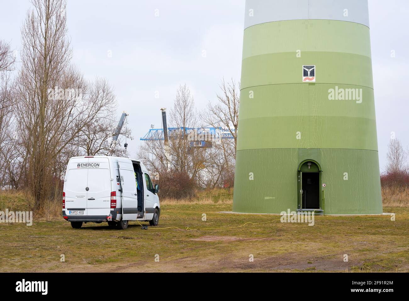 Maintenance work on a wind turbine of the company Enercon in the industrial area in Magdeburg in Germany Stock Photo