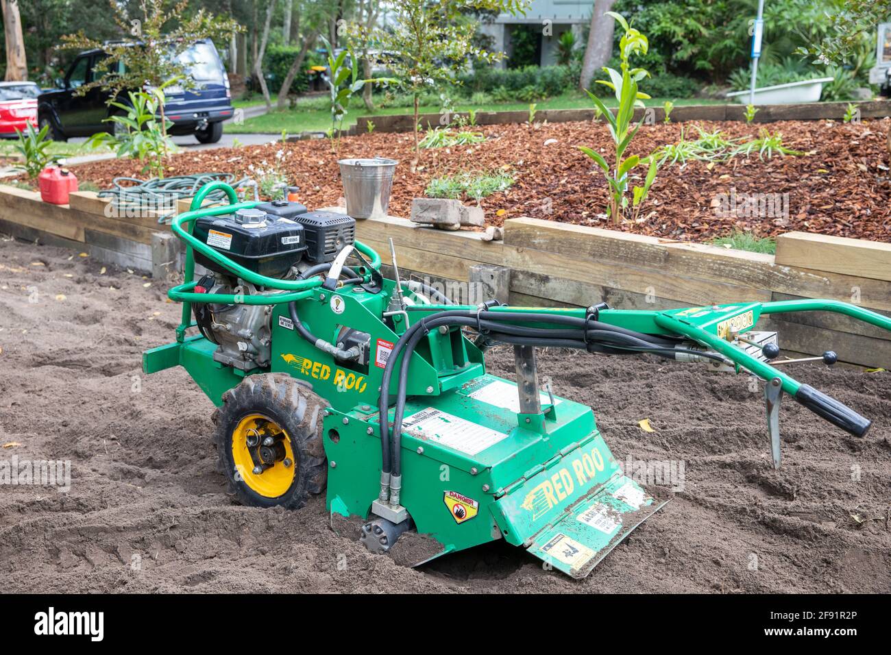 Red Roo Garden Rotary Hoe being used at a Sydney home to turn the clay