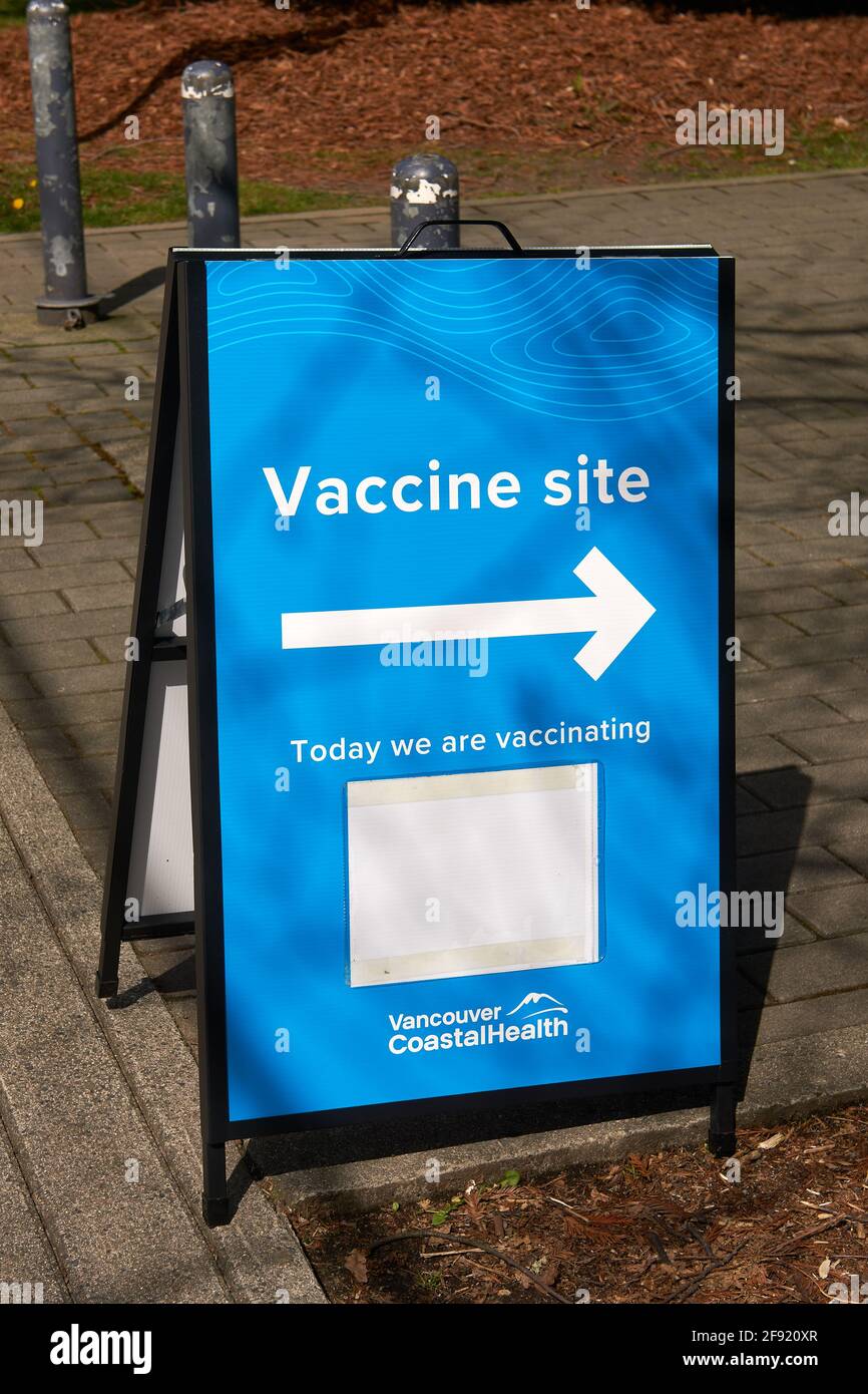COVID-19 vaccination site sign in Vancouver, British Columbia, Canada Stock Photo
