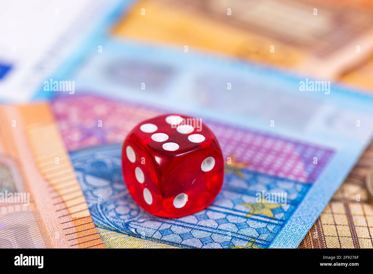 Colorful Dice Close Up On A Background Of Euro Banknotes Business Opportunity And Risk Concept Stock Photo Alamy