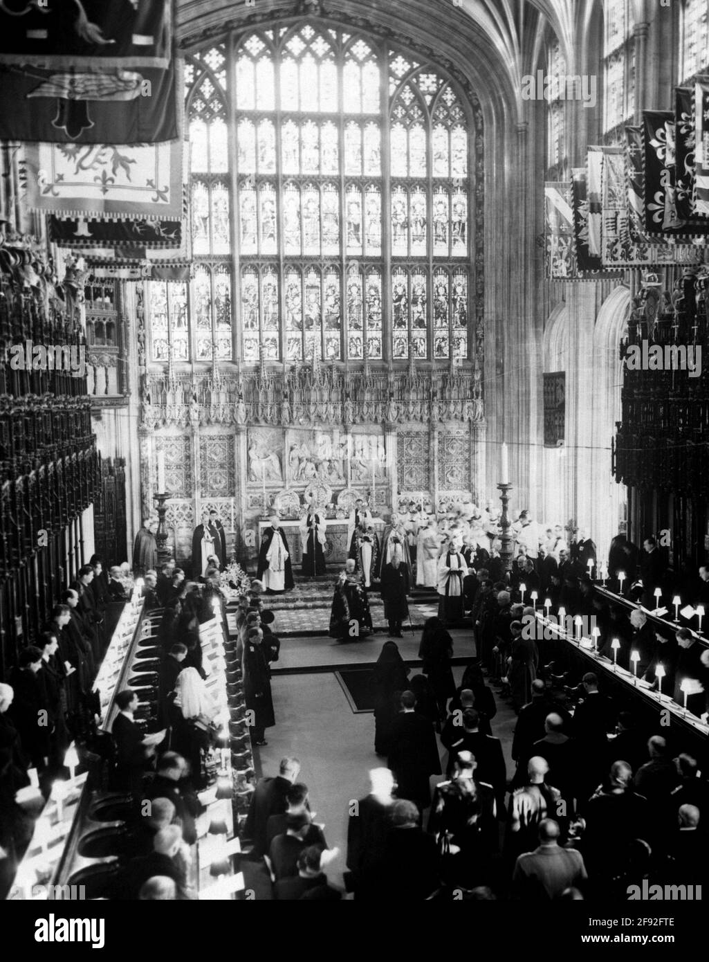 File photo dated 06/02/52 of the coffin of King George VI being lowered into the vault during his funeral at St. George's Chapel. Windsor Castle has been the setting for many funerals for the British monarchy, with the Duke of Edinburgh's service to be the first in 16 years. Issue date: Friday April 16, 2021. Stock Photo
