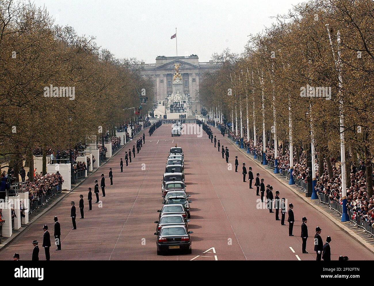 File photo dated 09/04/02 of the Queen Mother's coffin is driven back up the Mall from Westminster Abbey following her funeral service. The Queen mother's funeral was the last royal funeral to be extensively televised in the UK. Issue date: Friday April 16, 2021. Stock Photo