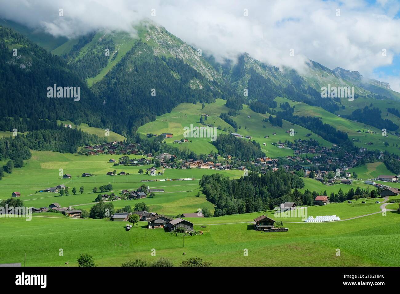 Swiss Rural Famous rural Switzerland with its high peaks and beautiful cloudscapes ...