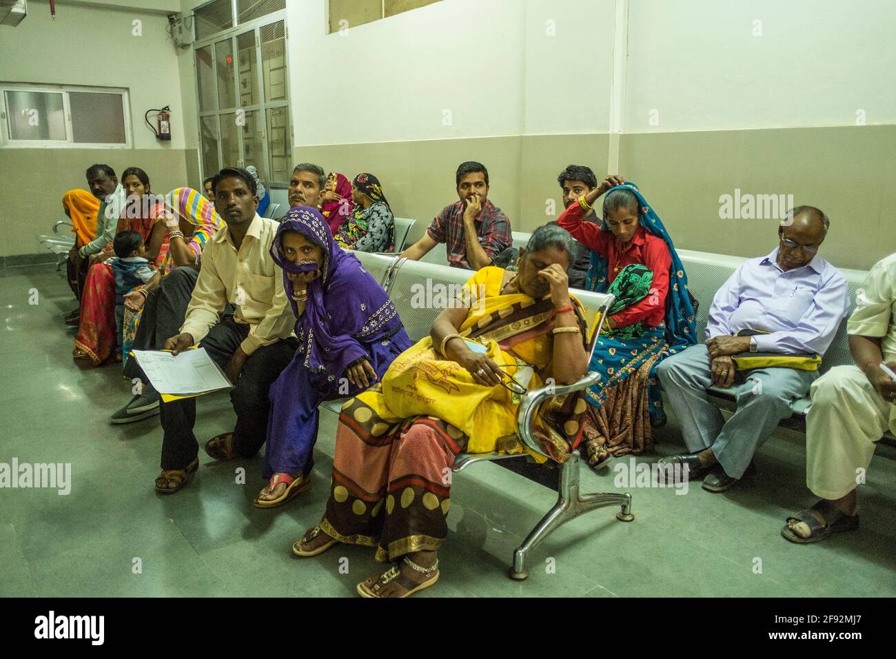 Patients wait their turn at a rural hospital in Rajasthan, India Stock