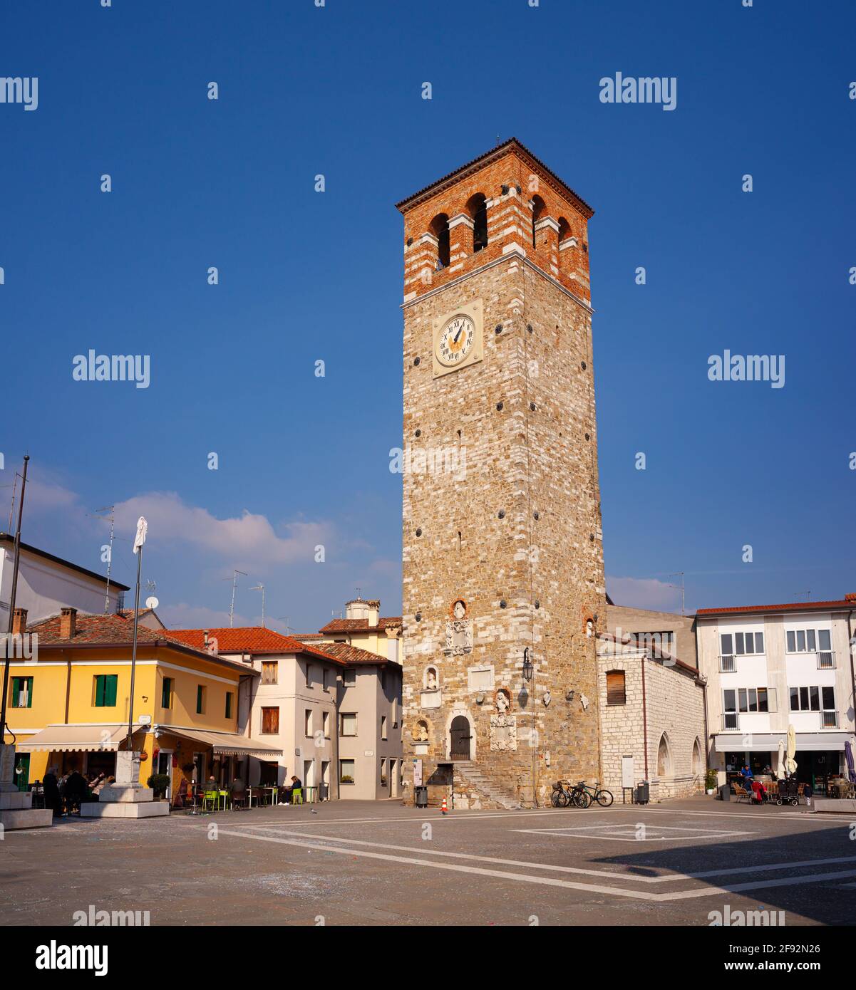 Marano, Italy - February, 16: View of the historic Millenaria (thousand-year old) tower in Marano square on February 16, 2021 Stock Photo