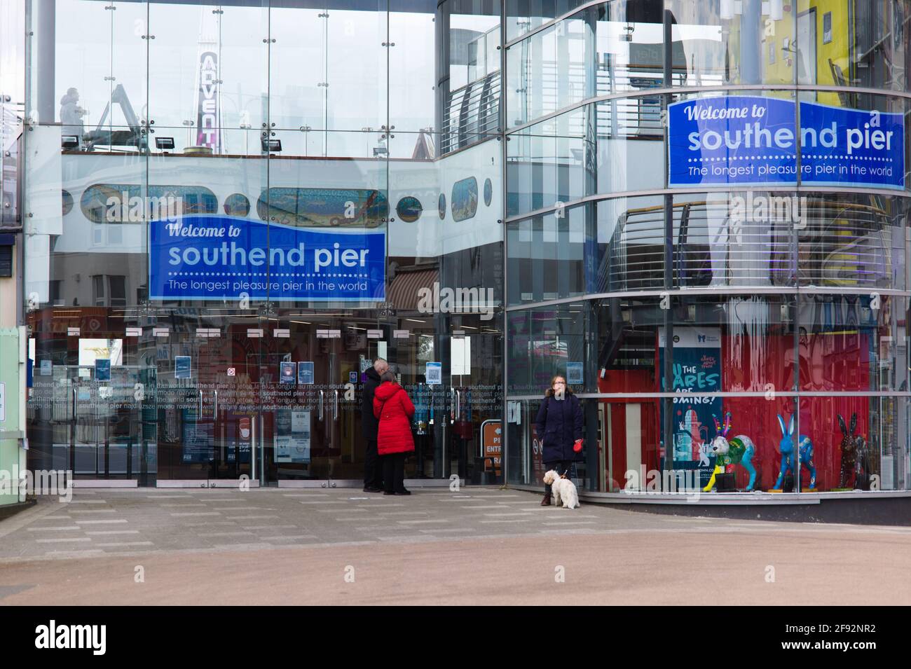 View of  people of mixed ages outside Southend Pier building, Southend-on-Sea, Essex, Britain, April 2021 Stock Photo