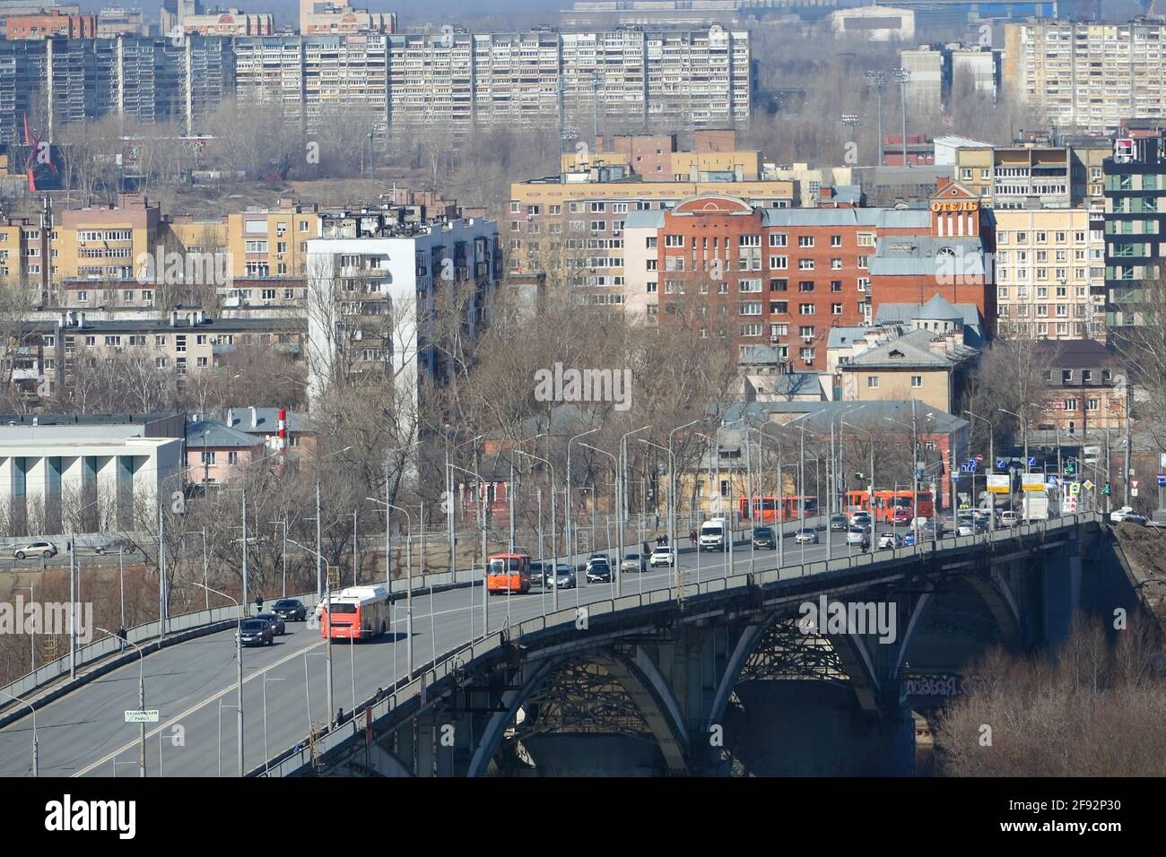 Panoramic view of the transport bridge over the river in the big city. Stock Photo