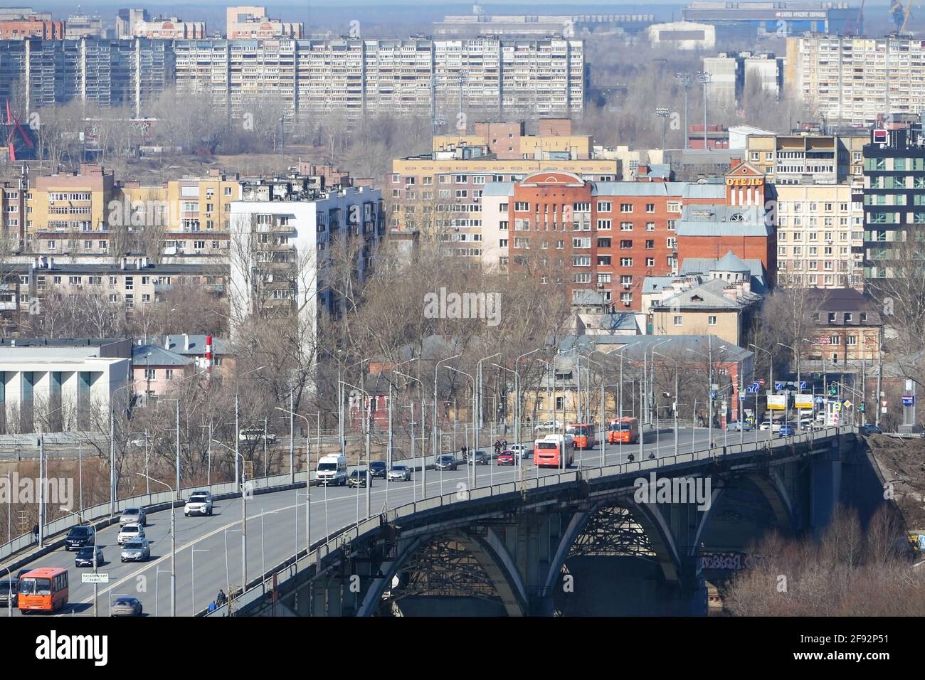 Panoramic view of the transport bridge over the river in the big city. Stock Photo