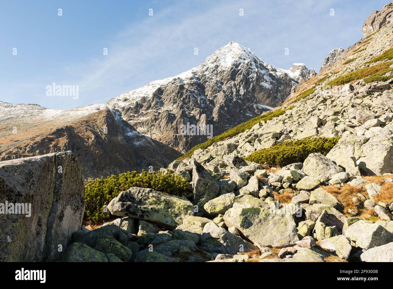 Spiky peaks of the mountain range on a summer day Stock Photo