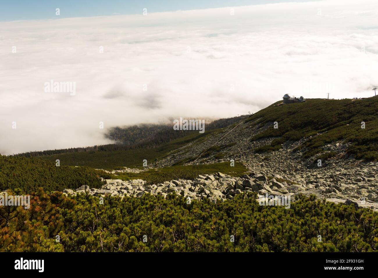 Summer landscape in mountains and the dark blue sky with clouds Stock Photo