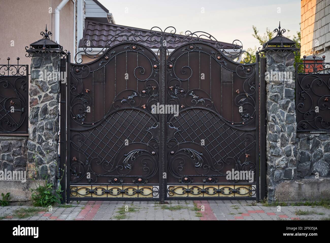 Black house entrance gate metal hi-res stock photography and ...