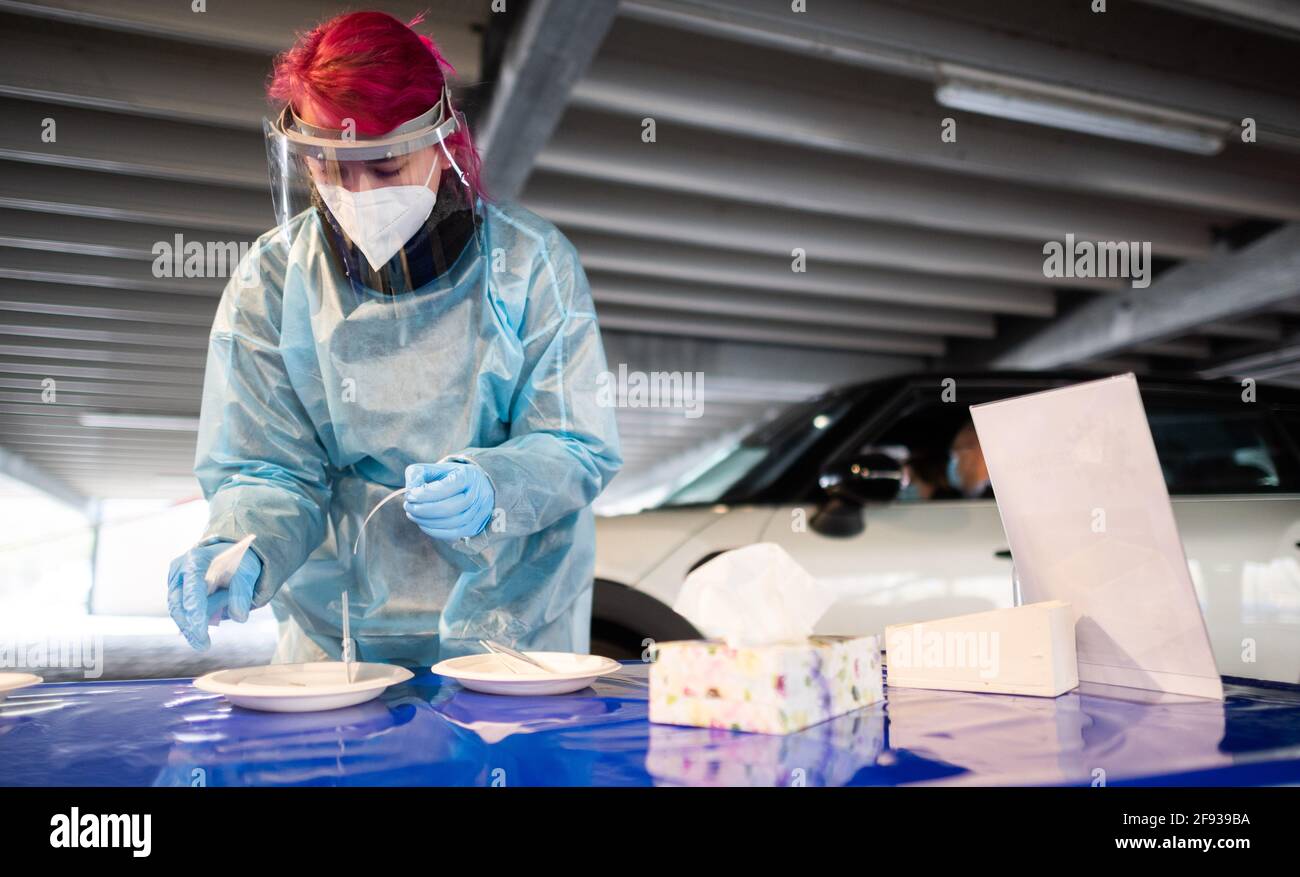 Hanover, Germany. 16th Apr, 2021. Helpers prepare Corona rapid tests at the 'Testzentrum am Zoo'. The Robert Koch Institute (RKI) continues to report an increase in new Corona infections in Germany. Credit: Julian Stratenschulte/dpa/Alamy Live News Stock Photo