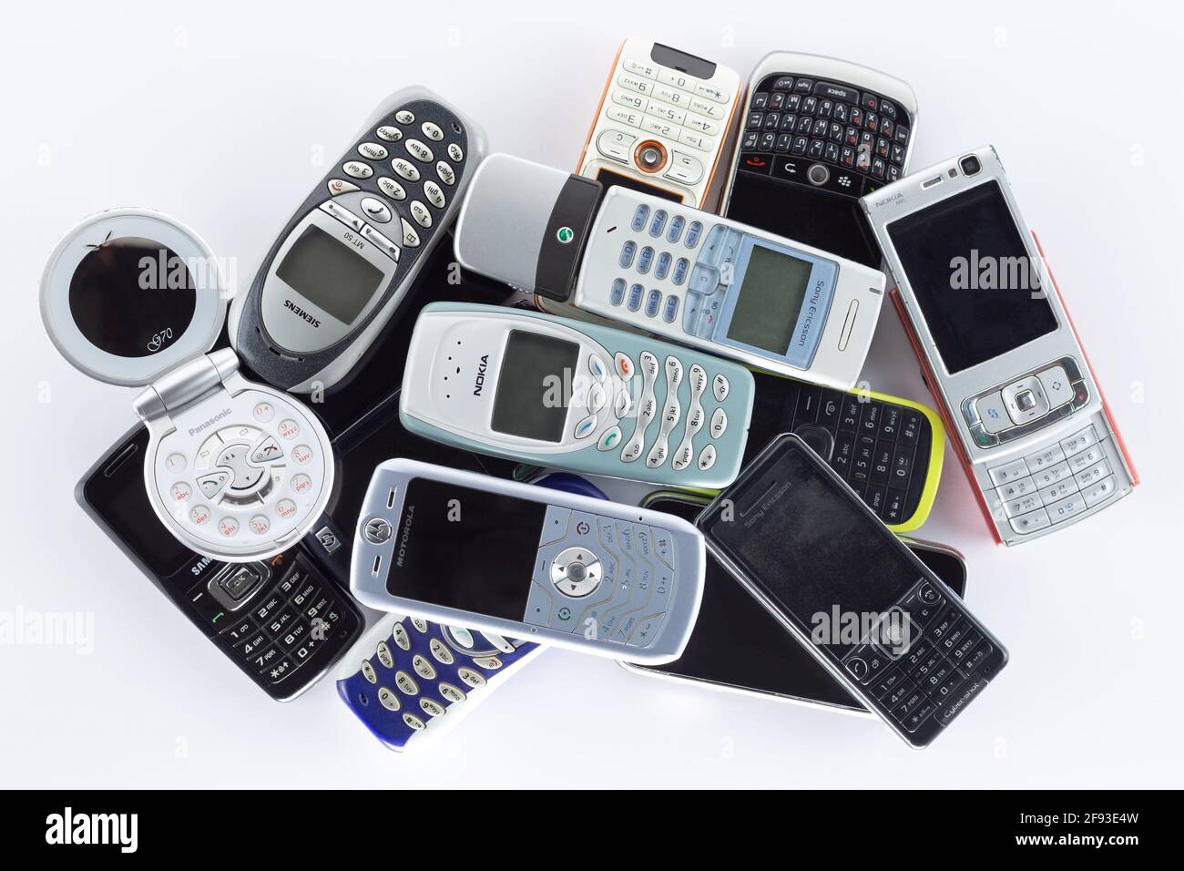 Prague, CZ- 21 January 2021:  Heap of Various brand old mobile phones. various types and generations. various types and generations gadgets. Editorial Stock Photo