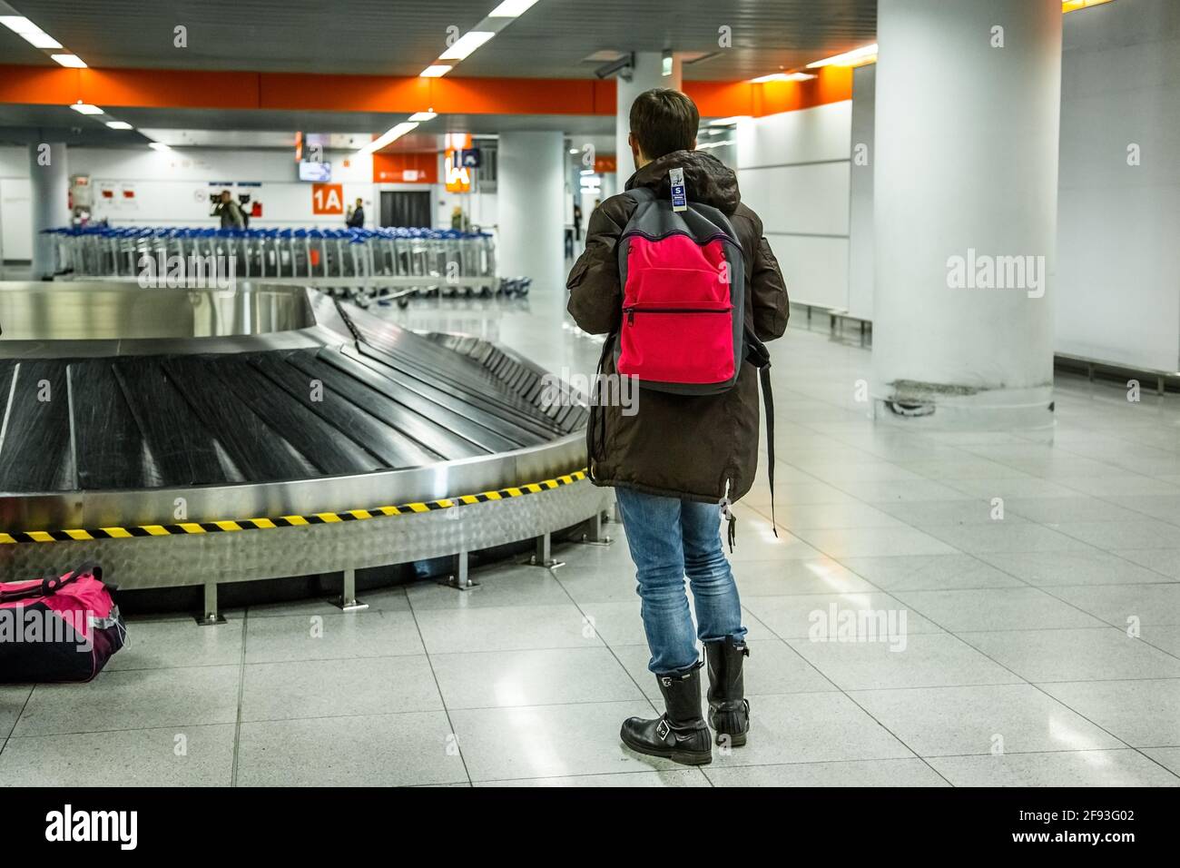 The tourist is going to take his luggage at the airport Stock Photo Alamy