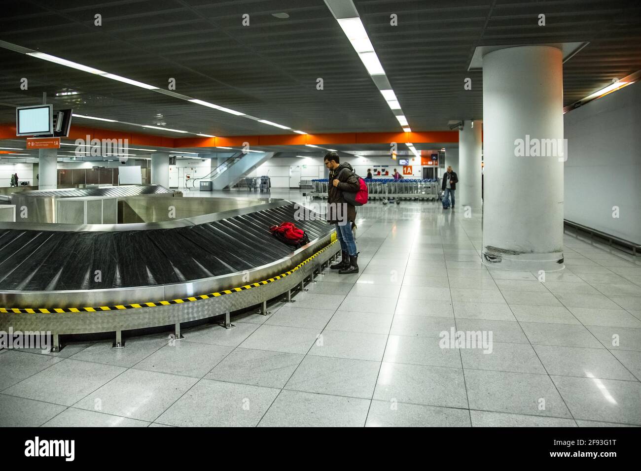The tourist is going to take his luggage at the airport Stock Photo Alamy
