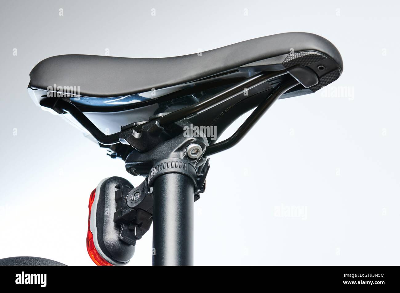 Bicycle seat isolated view from bottom isolated on grey background Stock Photo