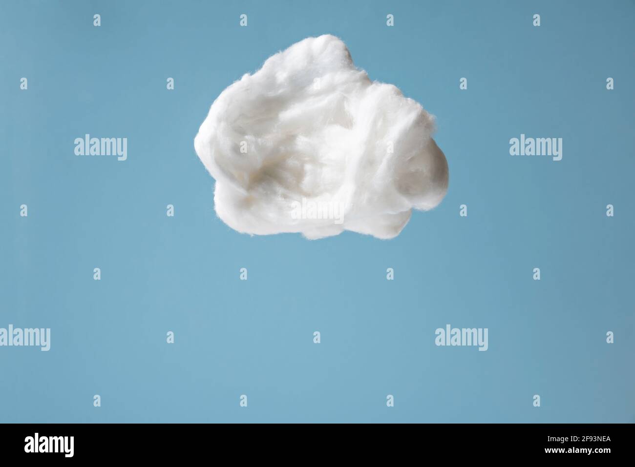 White cotton wool clouds on blue background Stock Photo - Alamy