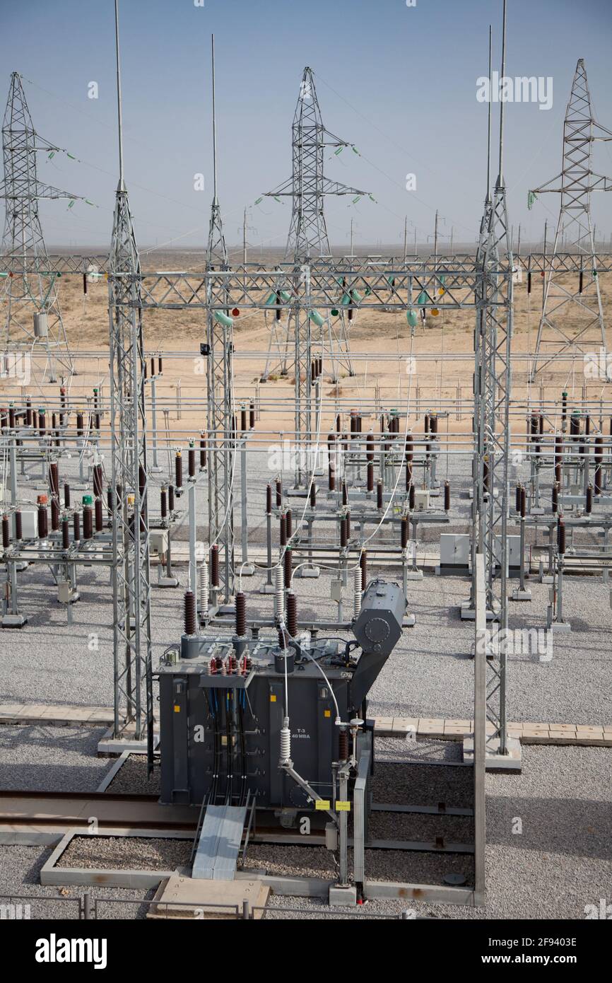 Kzylorda region/Kazakhstan - May 01 2012: Modern gas power plant. Transforming and distributing sub-station on desert background. Power transformer in Stock Photo