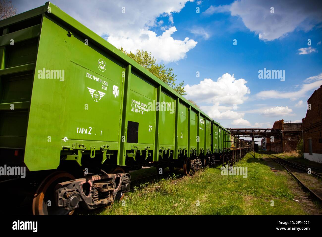 New green railroad hopper car. Train car-building plant. Petropavl, Kazakhstan. Stock Photo