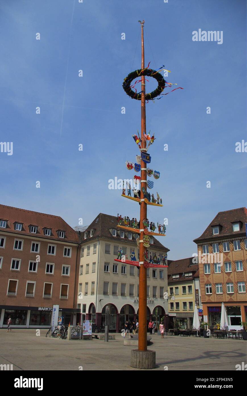 Maypole, showing trades of the city, Unterer Markt square, Wurzburg, Bavaria, Germany Stock Photo