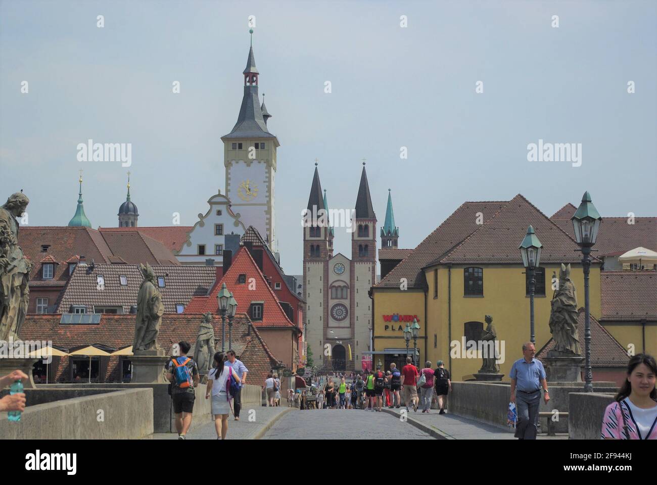 Alte Mainbrucke, old bridge over river Main, looking back towards the old town with cathedral and other spires and towers, Wurzburg, Bavaria, Germany Stock Photo