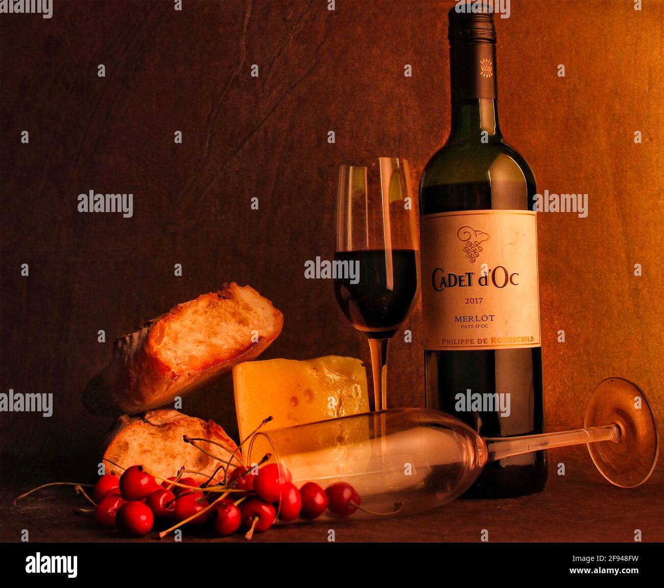 Studio shot of red wine bottle and glass, Mumbai, India Stock Photo
