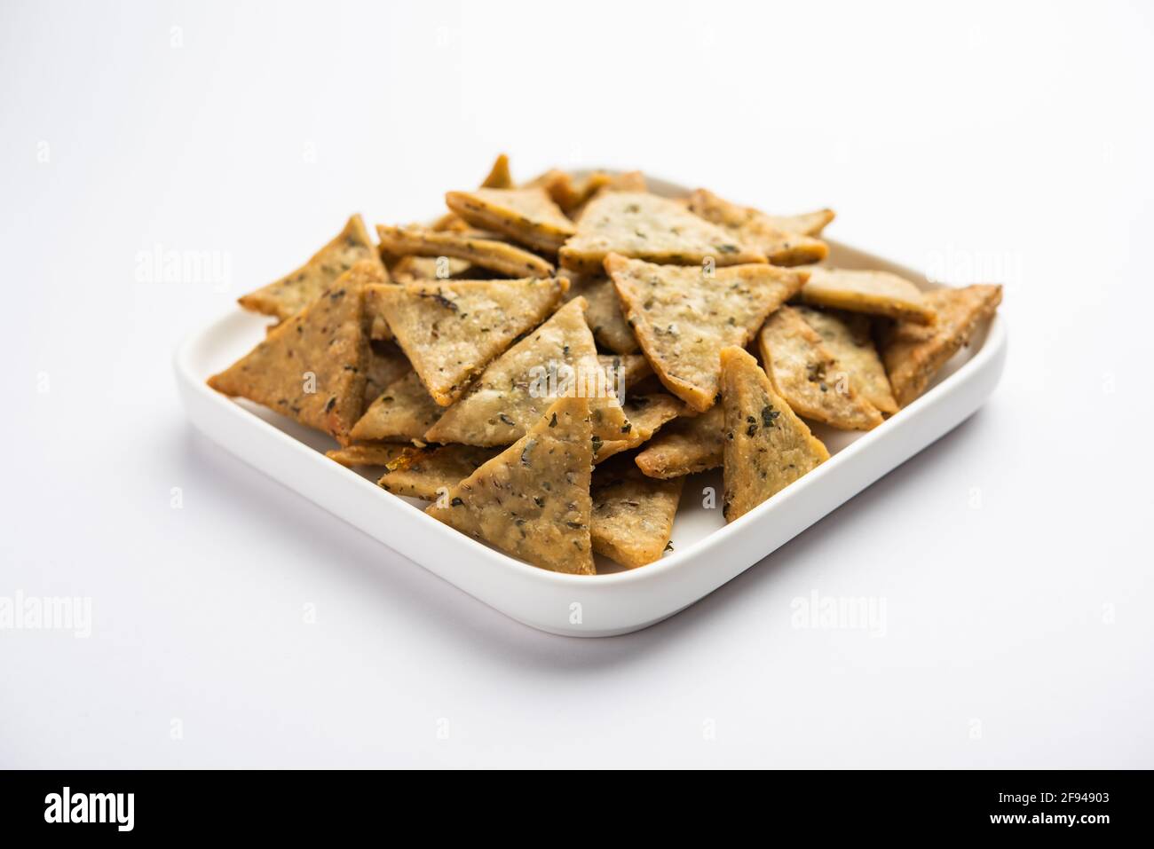 Triangular Mathri Indian Namkeen palak or Methi Mathri Triangle shape or Tikona - Salted ...