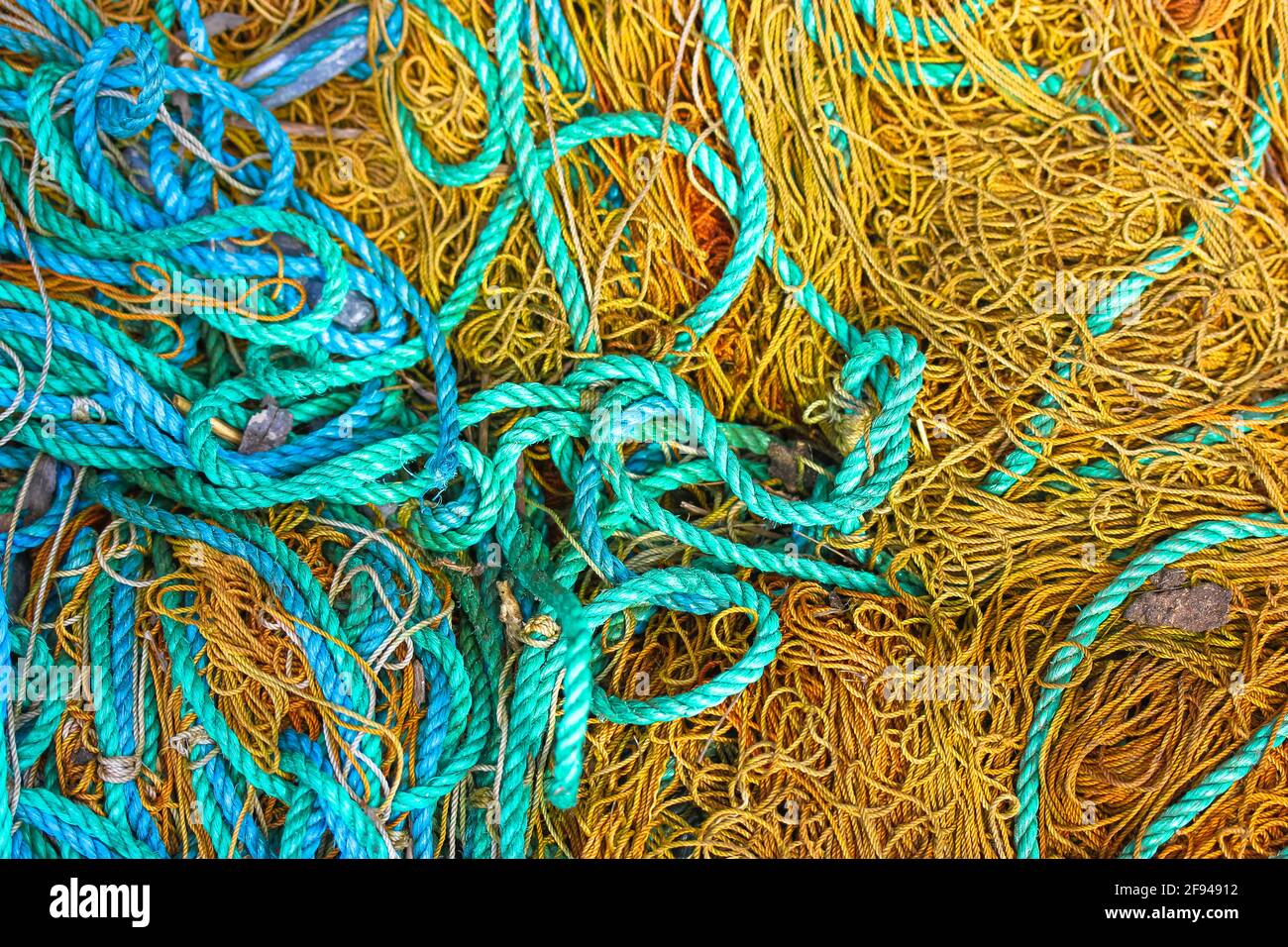 Various rough ropes scattered in a chaotic order, view from above ...