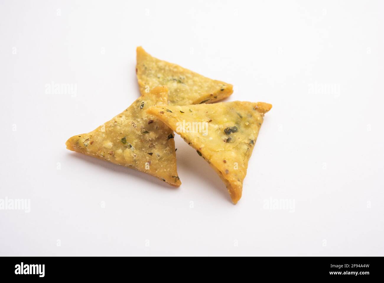 Triangular Mathri Indian Namkeen palak or Methi Mathri Triangle shape or Tikona - Salted ...