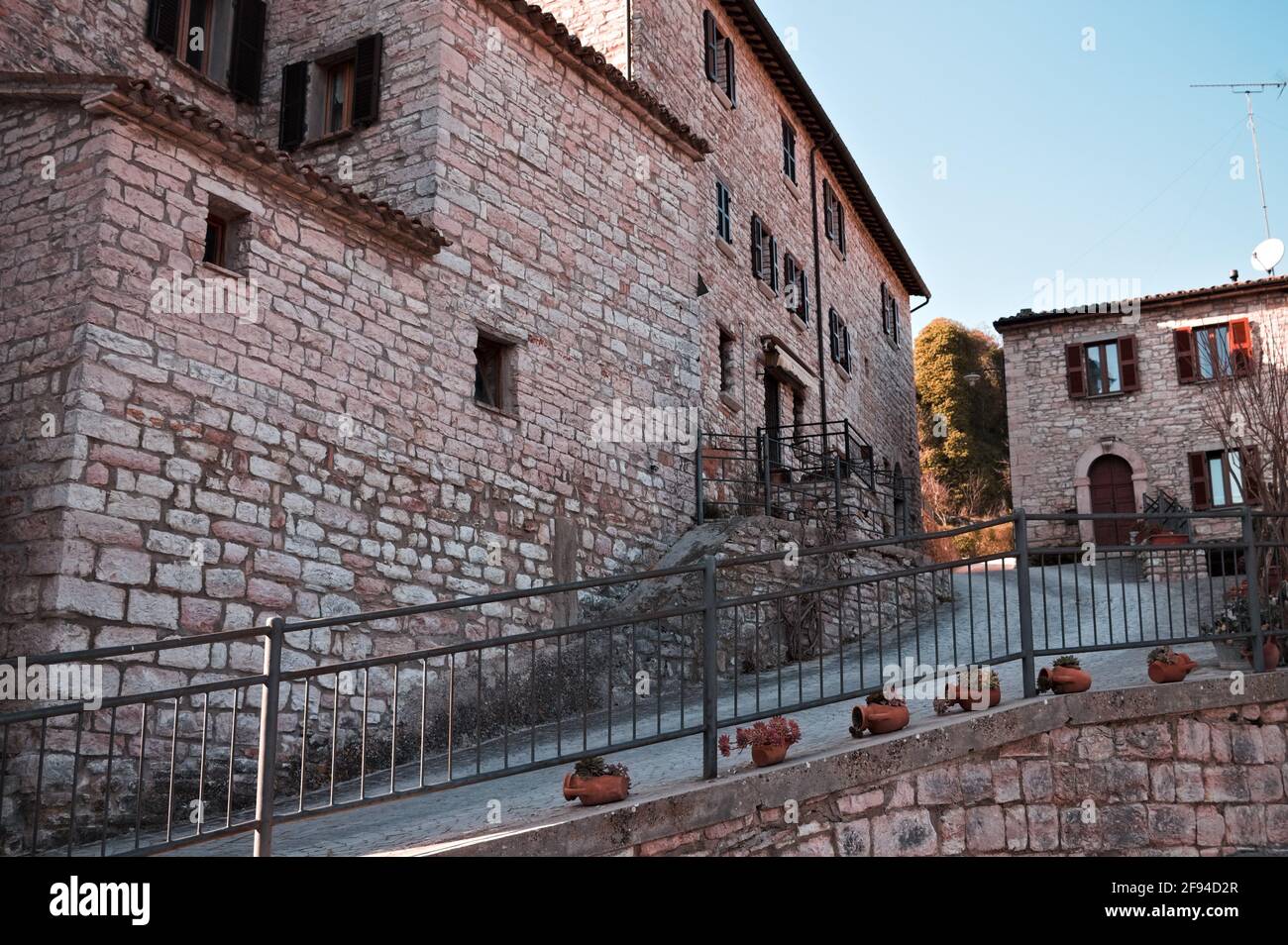 Stone houses in an ancient medieval Italian village (Marche, Italy ...