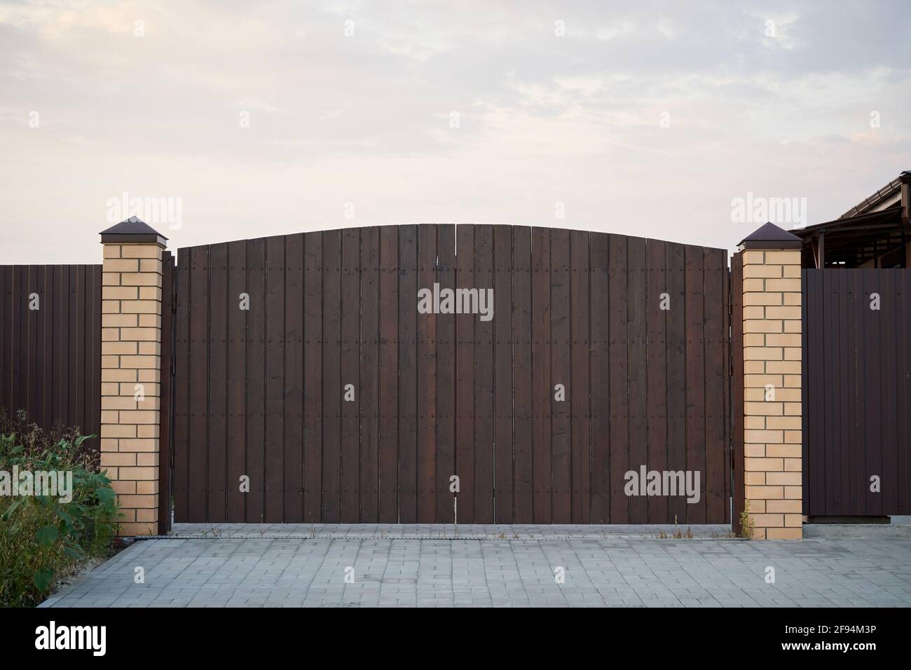 Minimalistic brown wooden gate Stock Photo Alamy