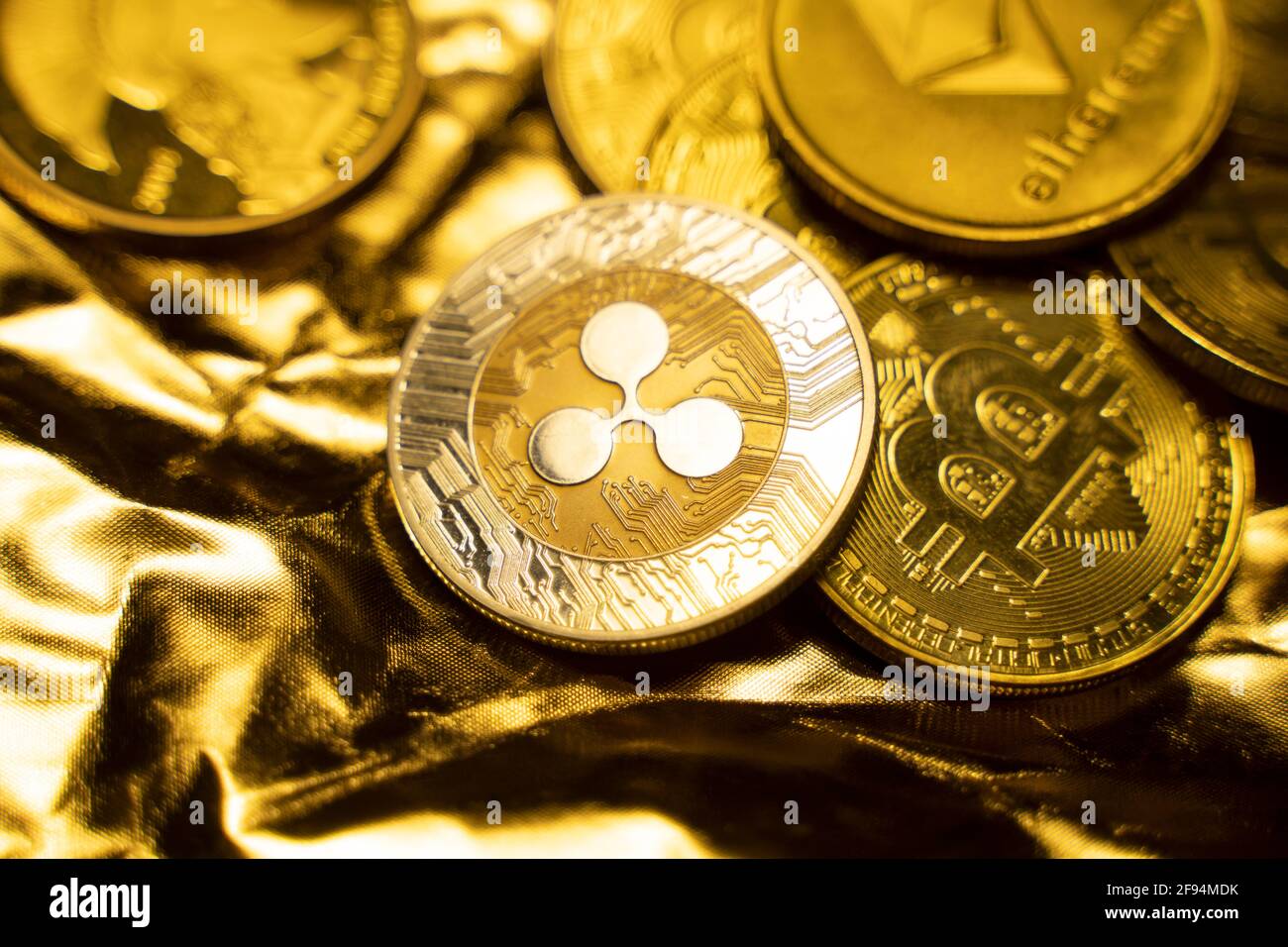 Gold Ripple coins on a golden background. Trading on the cryptocurrency  exchange. Cryptocurrency Stock Market Concept. Virtual money concept.  Mining Stock Photo - Alamy