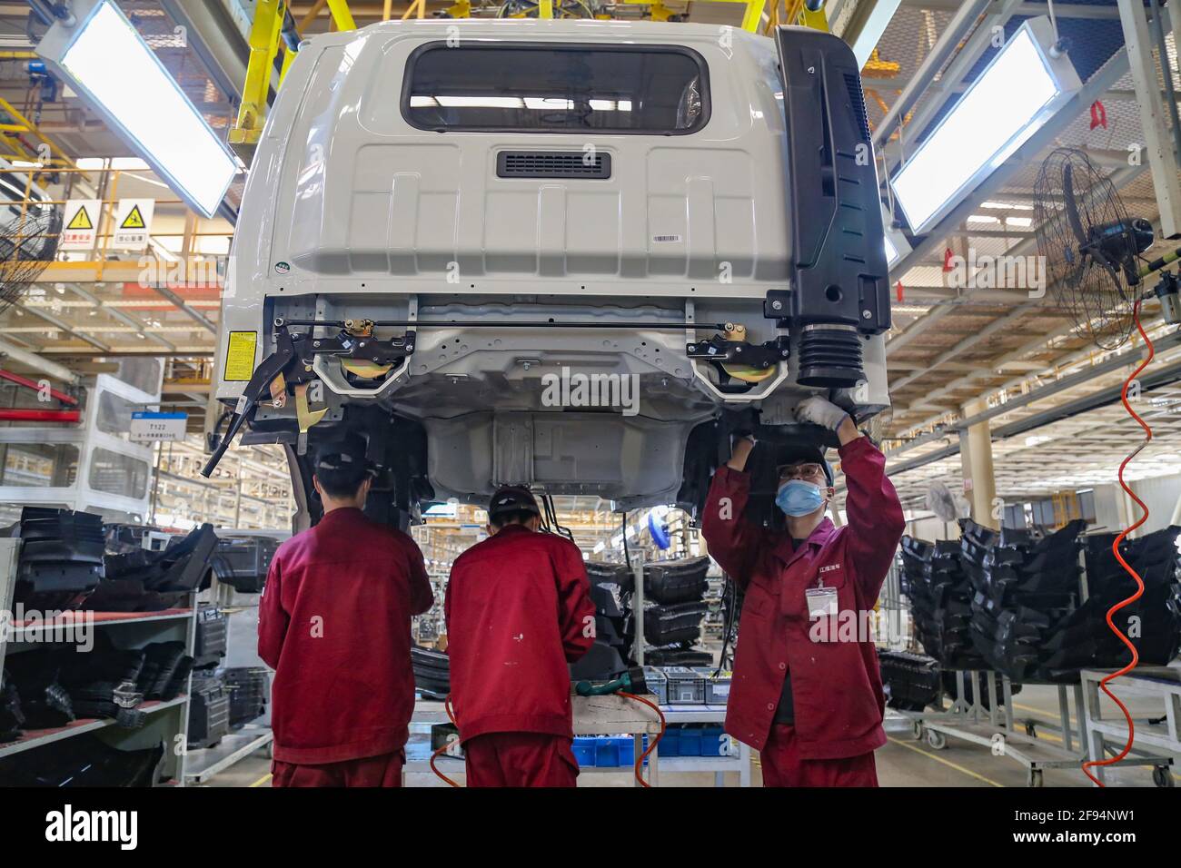 Weifang, China's Shandong Province. 16th Apr, 2021. Workers assemble ...