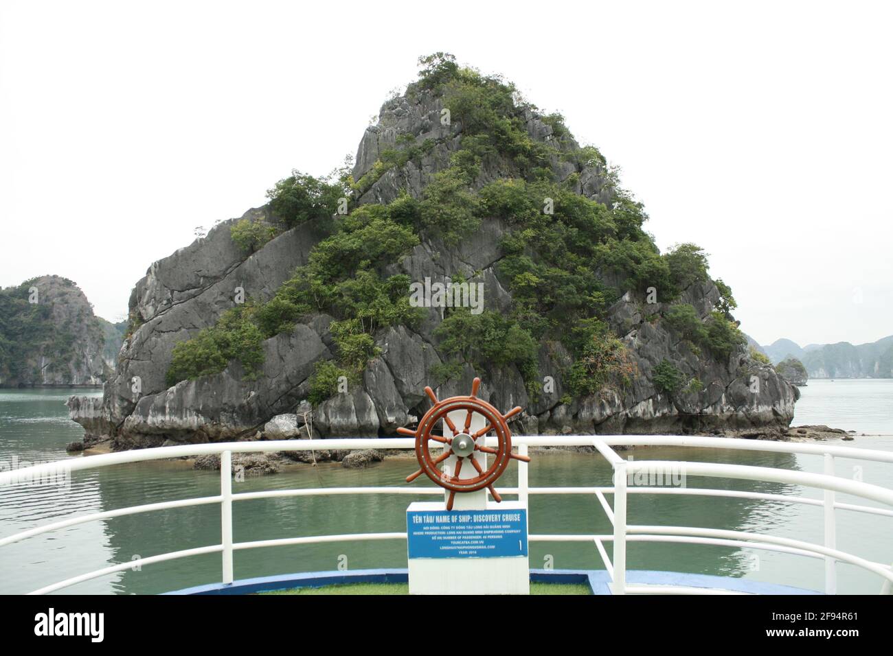 Photographs of ships in Halong Bay, Vietnam  from different perspectives, taken during daytime in misty weather on 06/01/20. Stock Photo