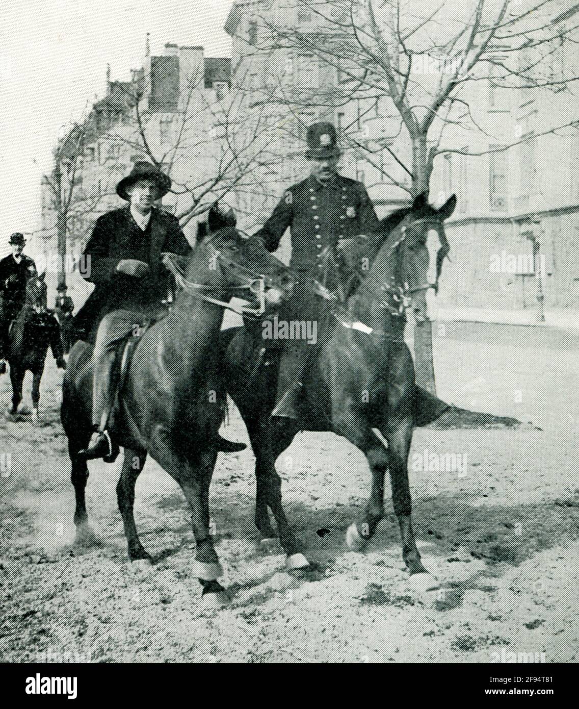 This 1903 photo shows a Mounted Police stopping a runaway horse. Stock Photo