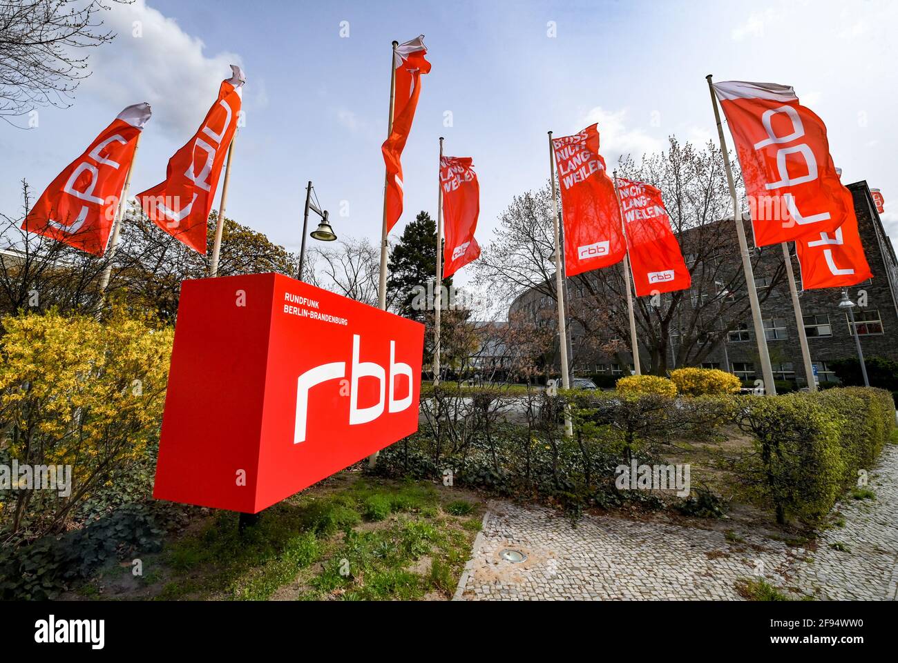 Berlin, Germany. 15th Apr, 2021. The logo and flags of the television  station and radio station Rundfunk Berlin-Brandenburg rbb at the location  Berlin Masurenallee. The Rundfunk Berlin-Brandenburg is the state  broadcasting corporation