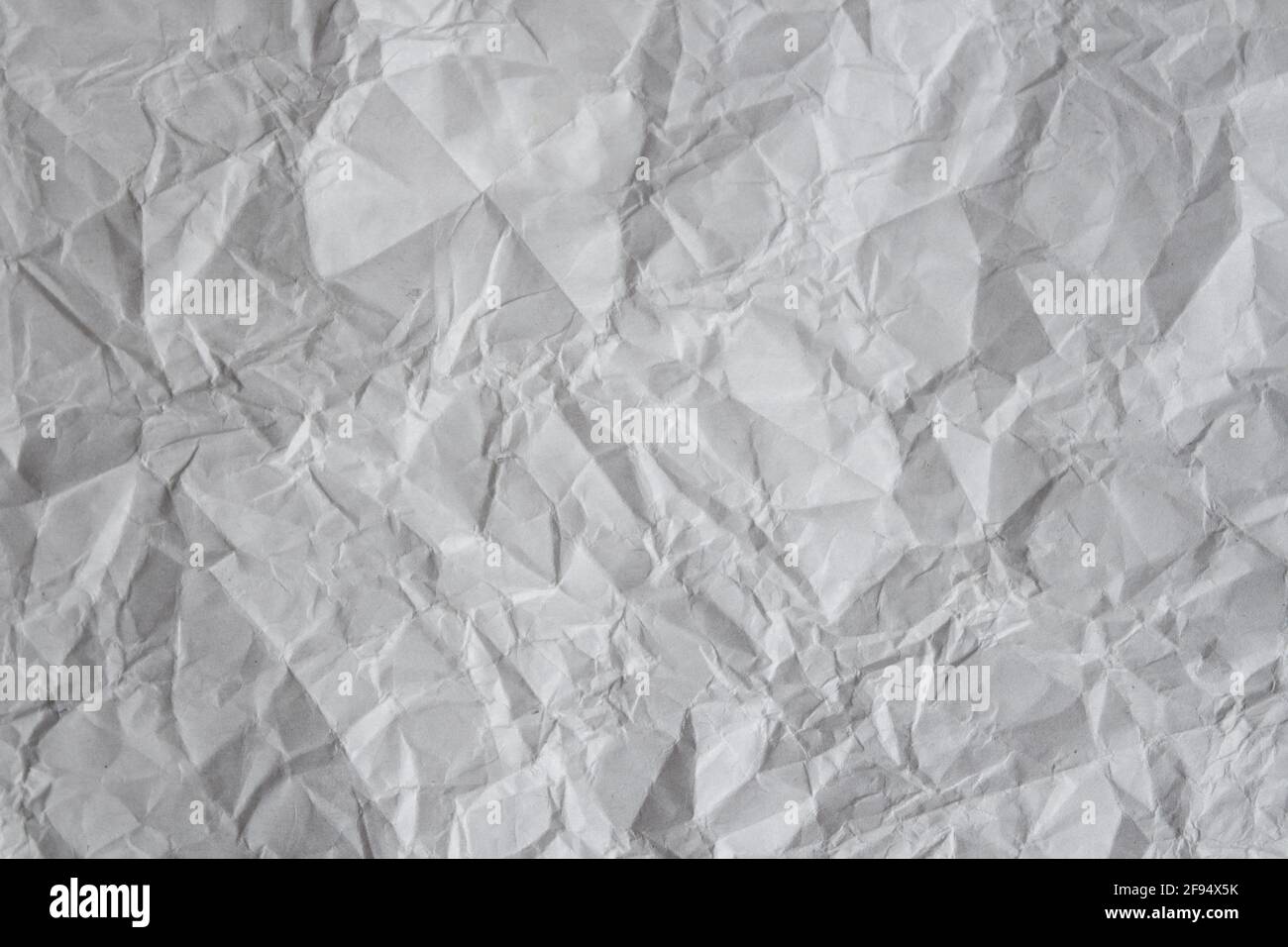 https://c8.alamy.com/comp/2F94X5K/gray-background-crumpled-paper-sheet-background-blank-creased-paper-texture-2F94X5K.jpg