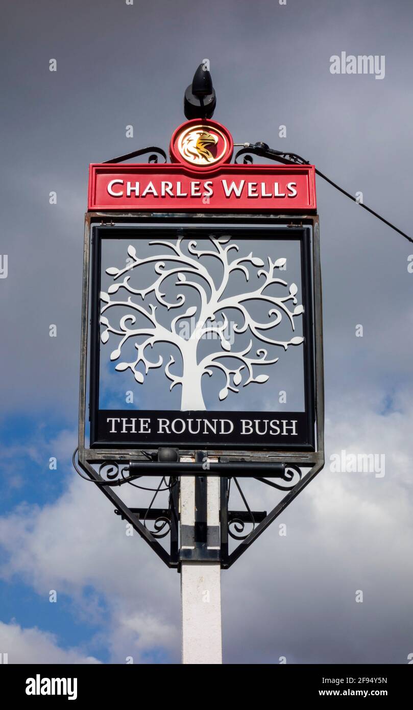 The Round Bush pub sign Stock Photo Alamy