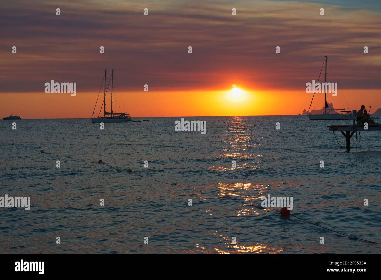 Sunset over boat on sea hi-res stock photography and images - Alamy