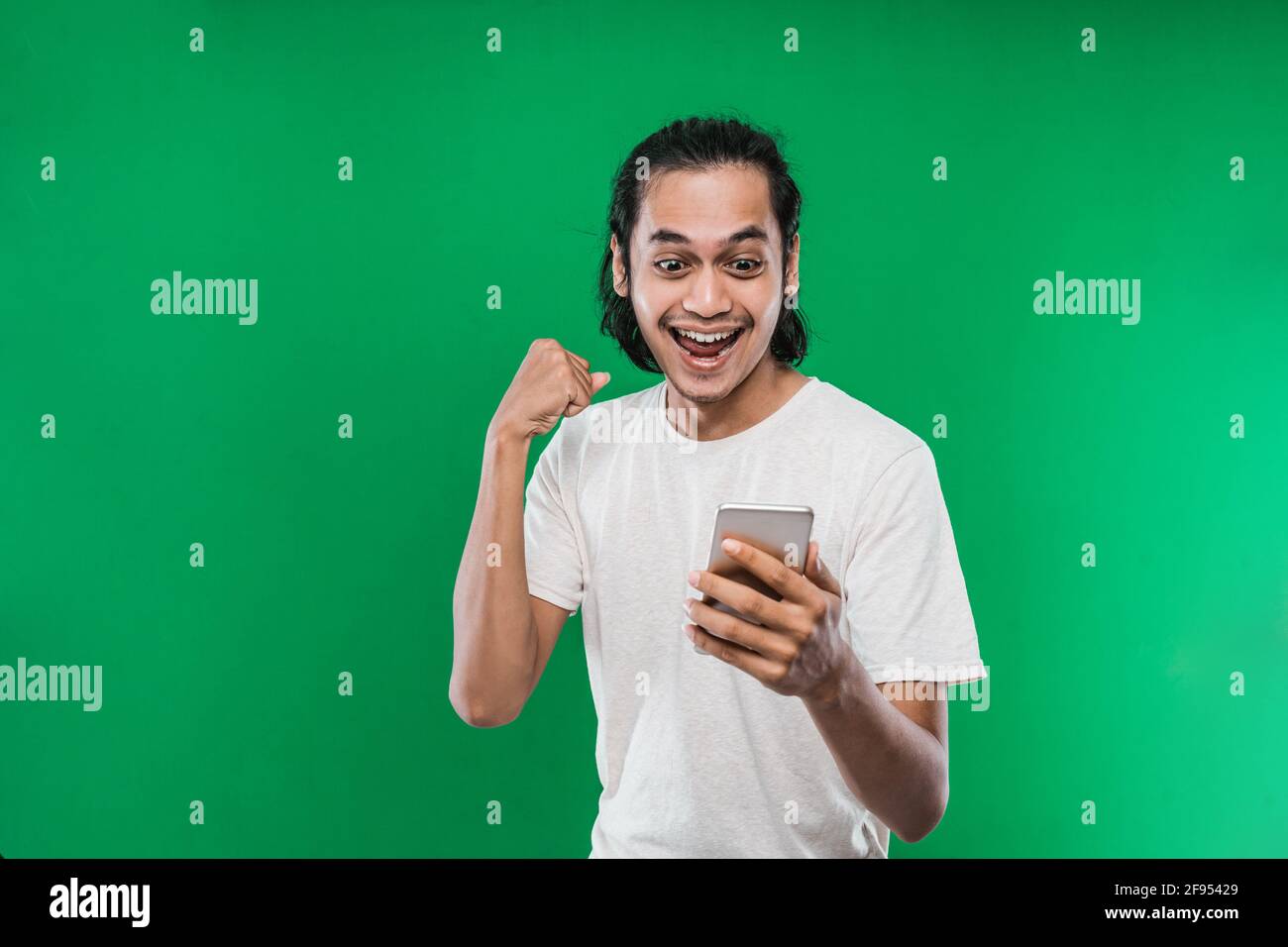 Asian happy shocked face hi-res stock photography and images - Alamy