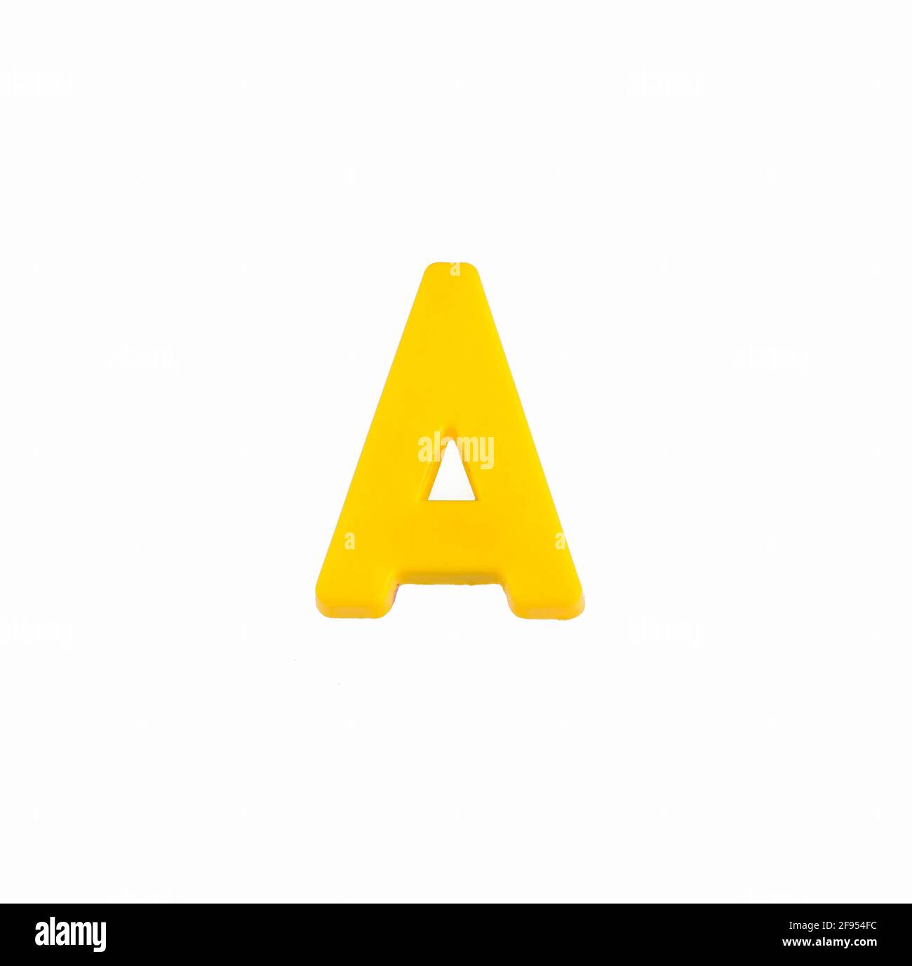 Letter A in yellow color Plastic part Stock Photo Alamy