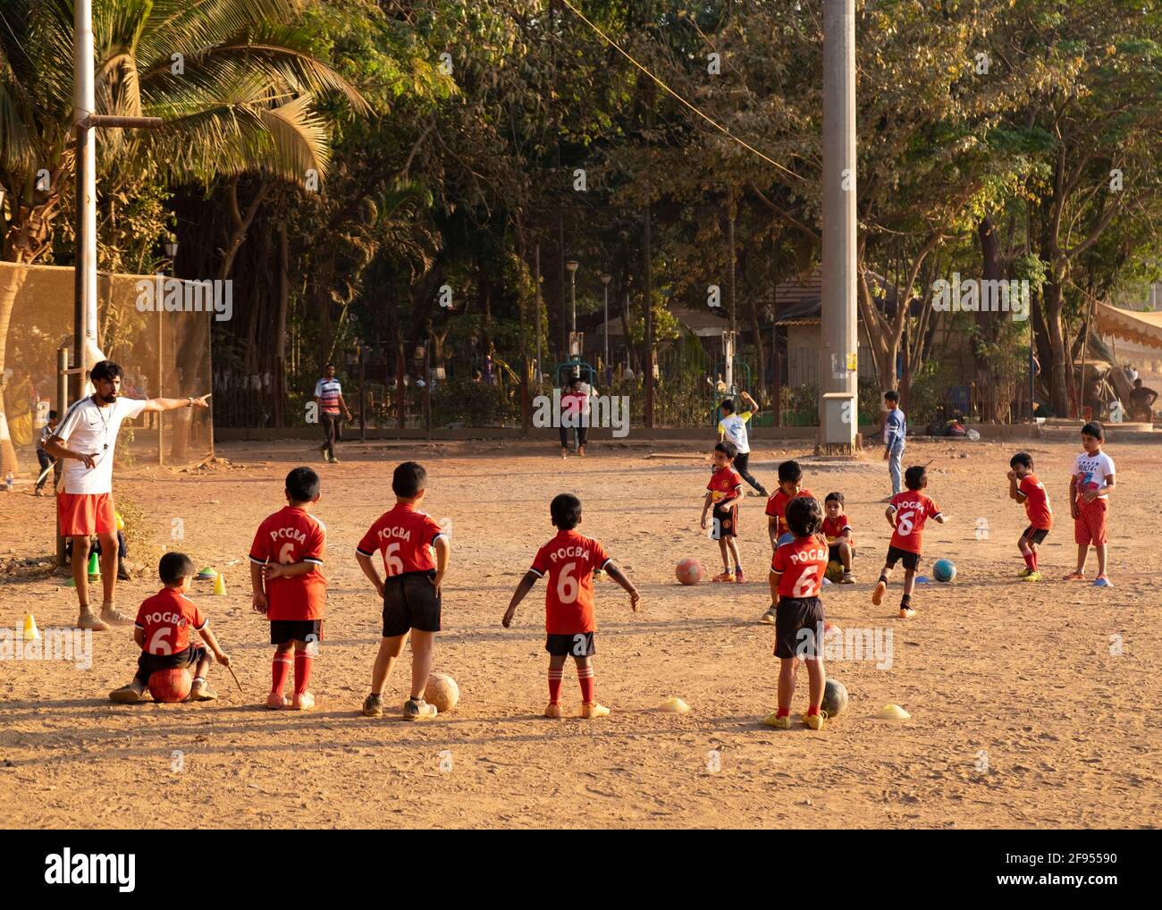 Young children having football/soccer  practice at the Ardash Football Club in Shivaji Park in Mumbai, Maharashtra,India Stock Photo