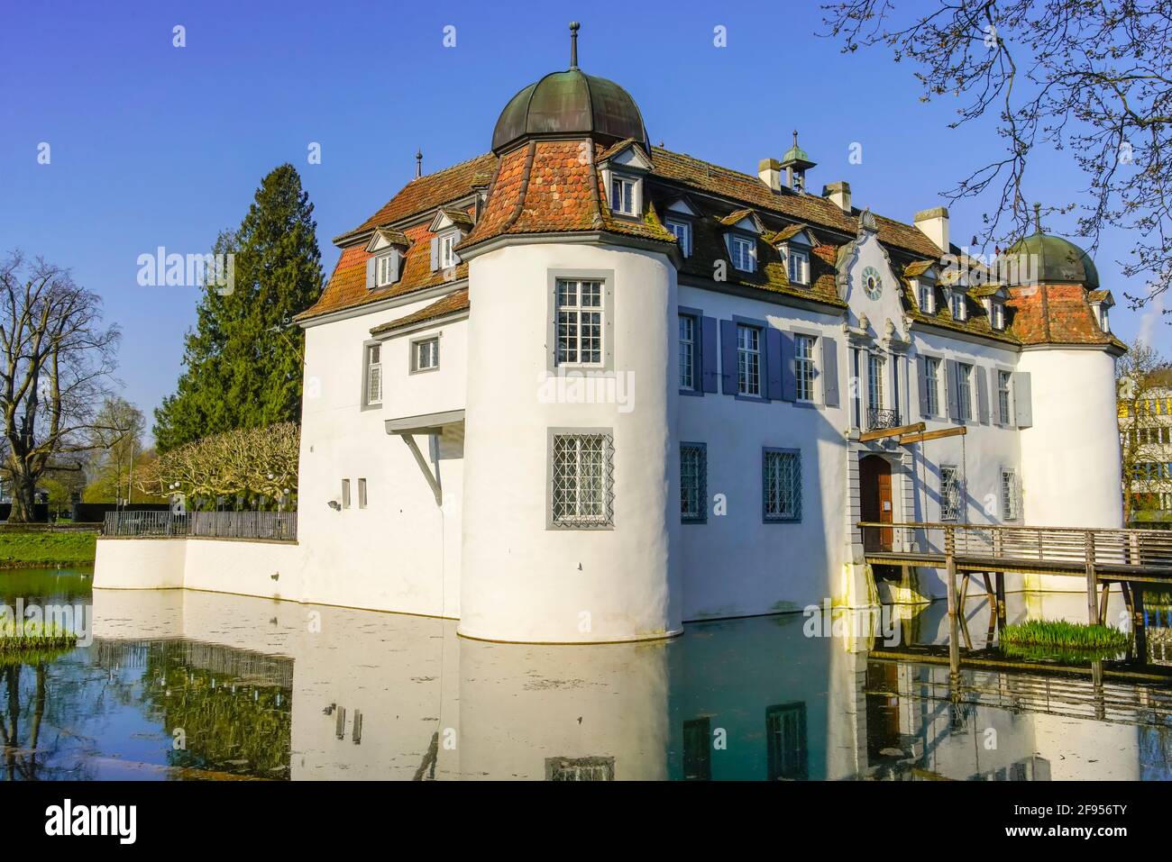 Water Castle in Bottmingen, municipality in the district of Arlesheim in the canton of Basel-Land, Switzerland. Stock Photo