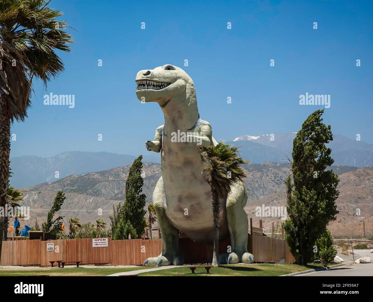 Cabazon, CA, USA: June 18th, 2010: A 65-foot-tall Tyrannosaurus rex known as Mr. Rex is part of a roadside attraction that stands near the freeway in Stock Photo