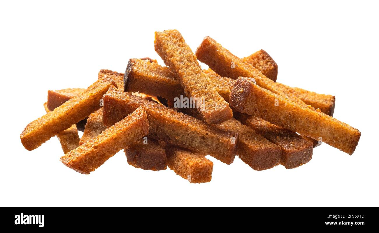 Pile of rye croutons isolated on white background Stock Photo