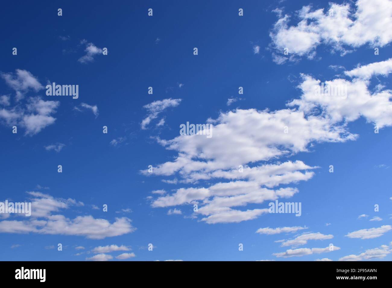 Blue sky and lots small clouds pattern. Deep blue sky and clouds Stock Photo